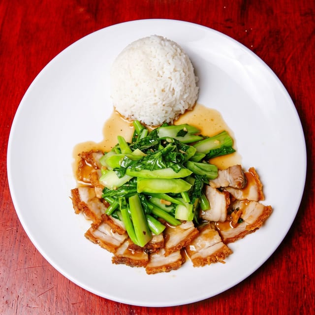 Phad Broccoli Leaves Pork Belly.